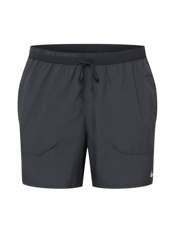 NIKE NIKE Спортен панталон 'Flex Stride'  черно / бяло