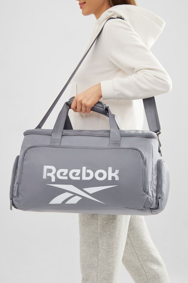 Reebok Чанта за пътуване Reebok СВЕТЛОСИВ