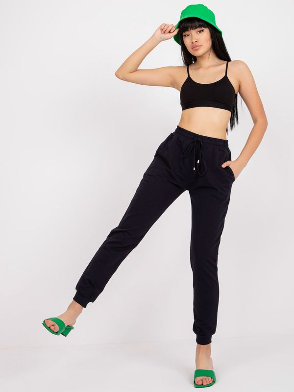 Fashionhunters Basic dark blue sweatpants with tie