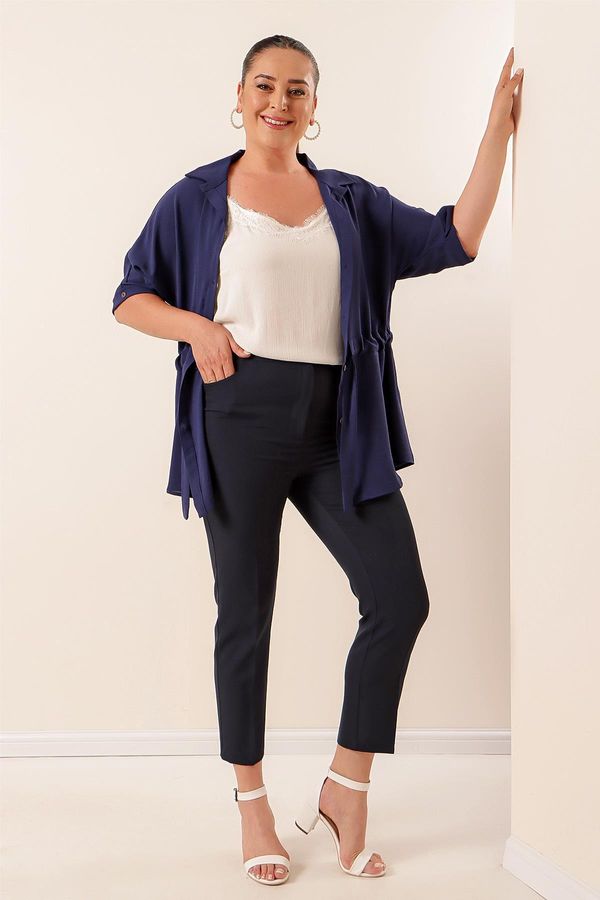 By Saygı By Saygı Lycra Plus Size Trousers throughout the length with an elasticated waist.