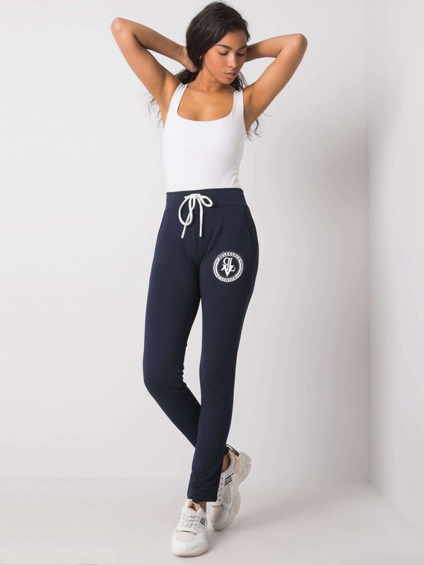 Fashionhunters Dark blue sweatpants with application