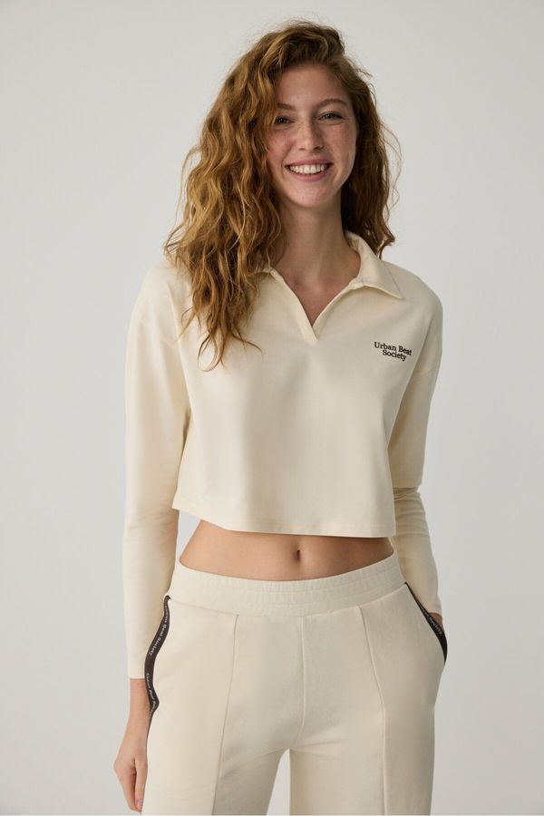 GRIMELANGE GRIMELANGE Eudora Urbanbeat Women's Polo Neck Placket Long Sleeve Print Detail Ecru T-Shir