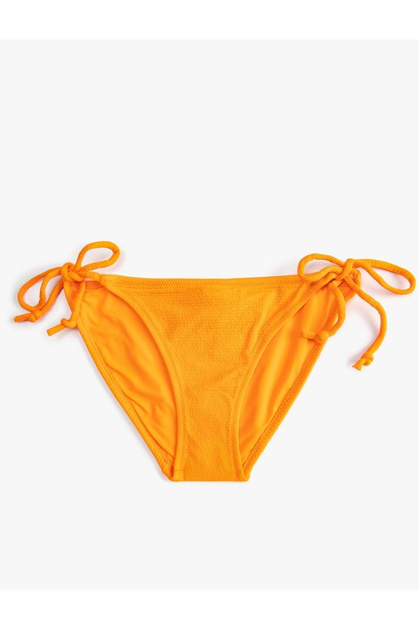Koton Koton бразилски бикини дъна основни текстурирани вратовръзка отстрани.