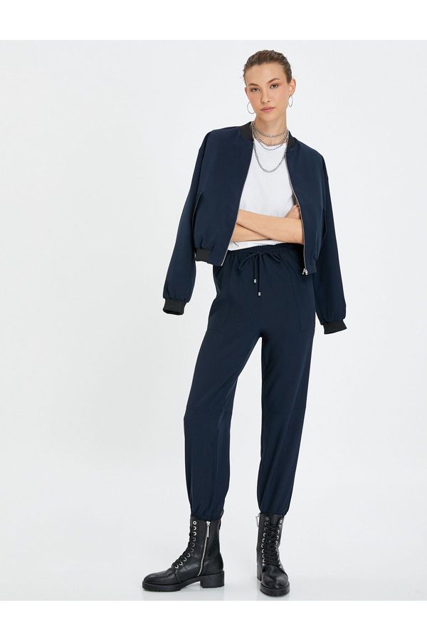 Koton Koton джогър панталони с дантела нагоре нормална талия джоб детайл.