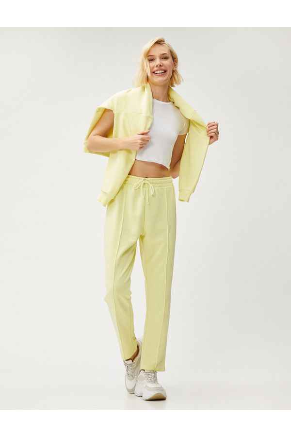 Koton Koton Кльощави крака Sweatpants Оребрена вратовръзка талията.