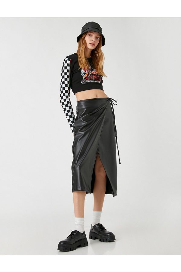 Koton Koton Midi Skirt with Deep Slits and Wrapover Fastening with a Leather Look.