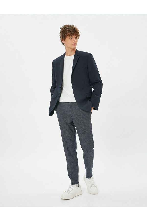 Koton Koton Patterned Woven Trousers with Pockets and Buttons.