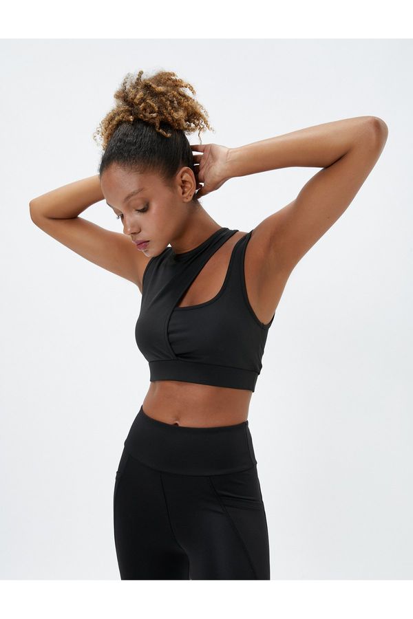 Koton Koton Sports Bra. Padded, Non-wired Sports Bra with Window Detail in the Back and Straps.