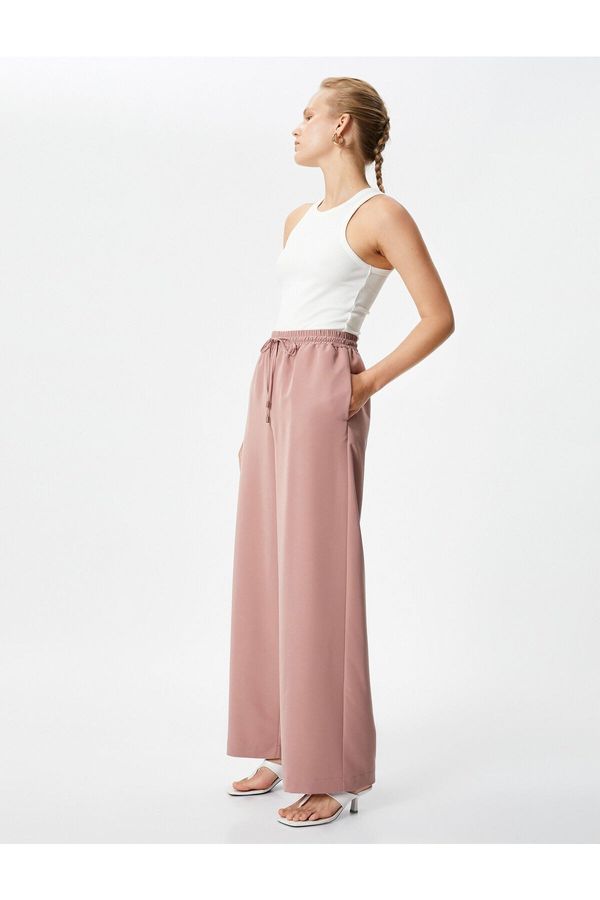 Koton Koton Wide Leg Trousers with Lace-Up Waist, Pockets Modal Relaxed Cut.