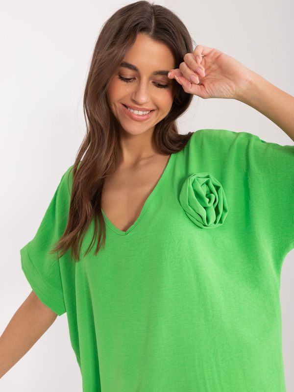 Fashionhunters Light green oversize blouse with flower
