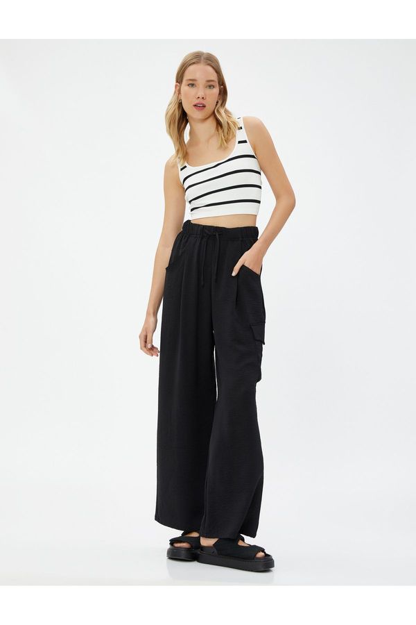 Koton Панталон Koton Cargo с ластик на талията, широки крачоли, джобове, текстурирани.