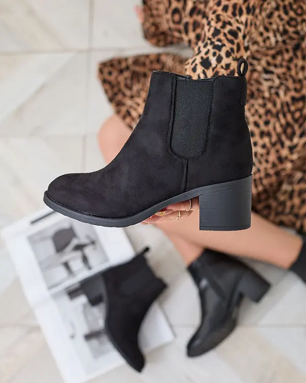 Resti Resti Black eco-suede women's boots on a post Nanhelyna