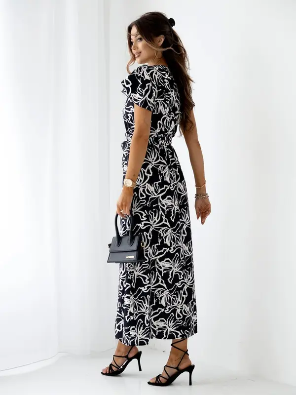 Resti Resti Patterned women's midi dress with short sleeves, wrap neckline, and belt