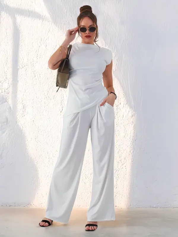 Resti Resti Women's ribbed set, with an asymmetrical sleeveless top and flared pants