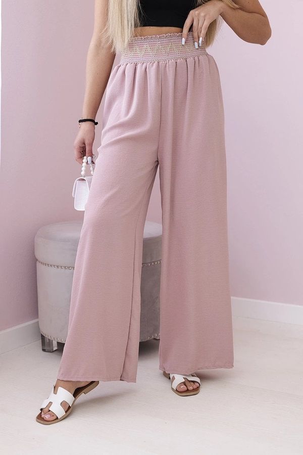 Włoski Trousers with a wide elastic waistband in dark pink colour