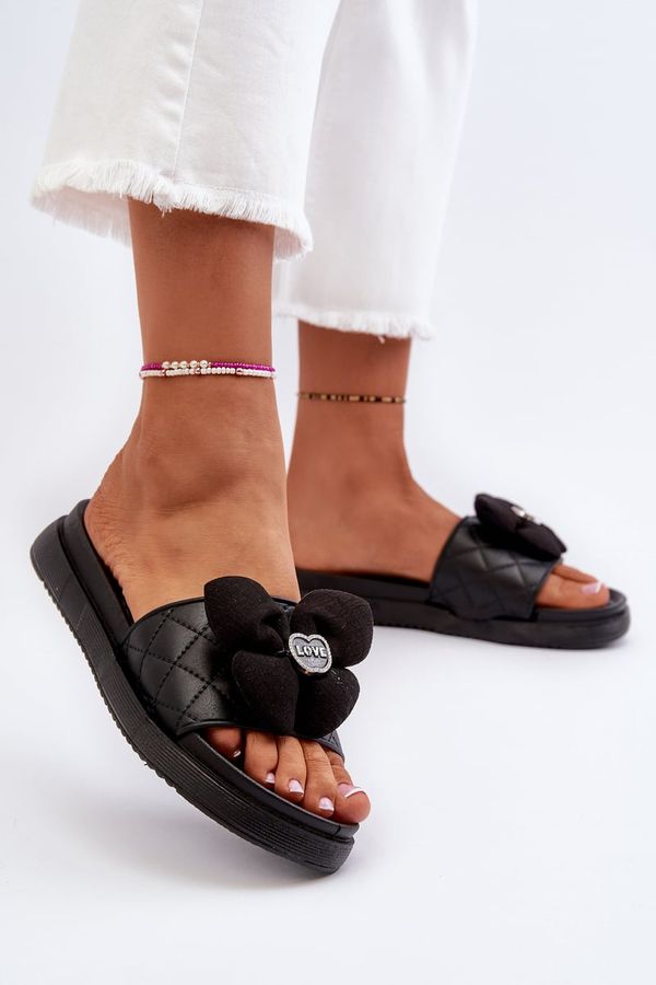 Kesi Women's slippers with low platform embellishments, black cedrella