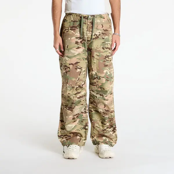 PLEASURES Панталони PLEASURES Gem Camo Wide Pants Camo L
