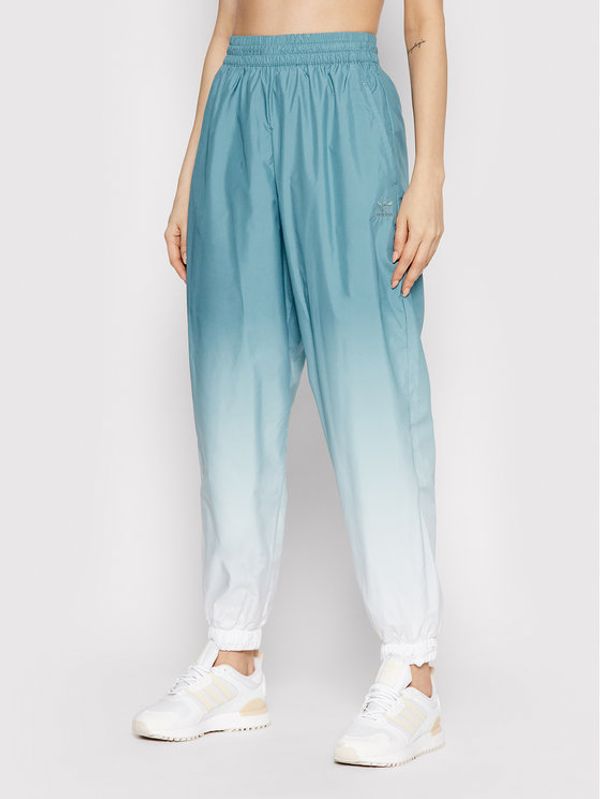 adidas adidas Долнище анцуг adicolor 3D Trefoil GN2850 Зелен Loose Fit