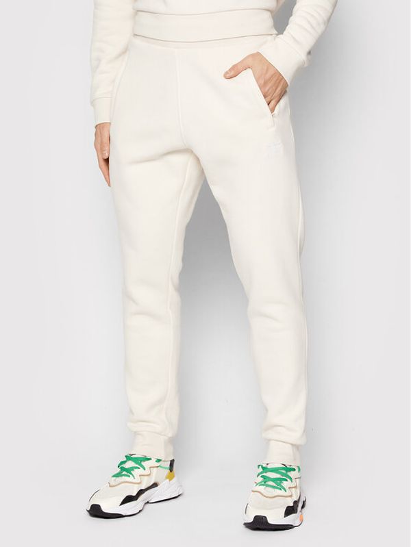 adidas adidas Долнище анцуг adicolor Essentials HE9410 Бежов Slim Fit
