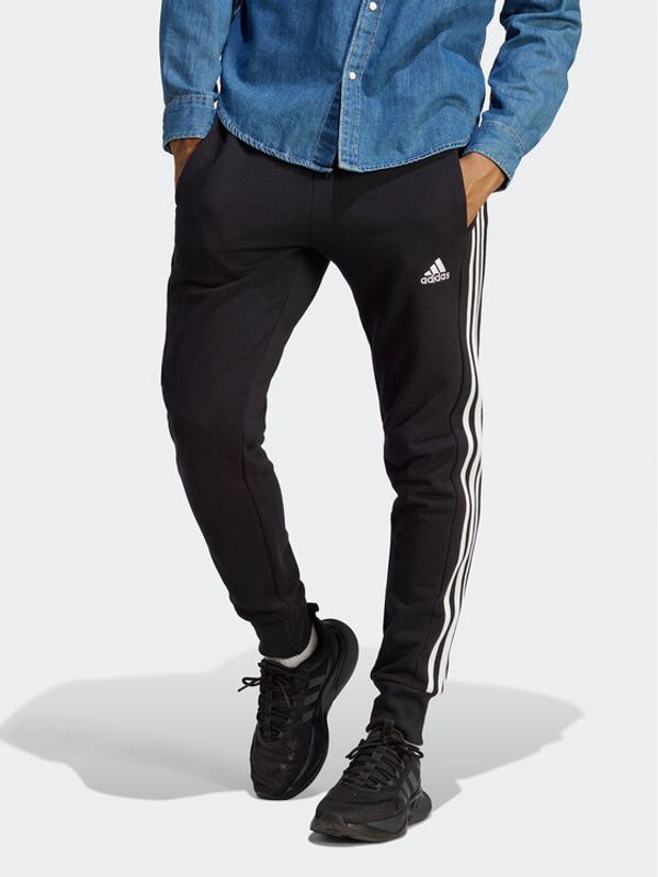 adidas adidas Долнище анцуг Essentials French Terry Tapered Cuff 3-Stripes Joggers HA4337 Черен Regular Fit