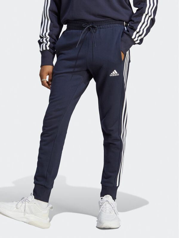 adidas adidas Долнище анцуг Essentials French Terry Tapered Cuff 3-Stripes Joggers IC9406 Син Regular Fit