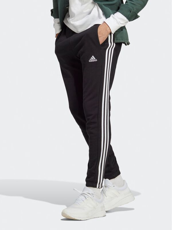 adidas adidas Долнище анцуг Essentials French Terry Tapered Elastic Cuff 3-Stripes Joggers IC0050 Черен Regular Fit