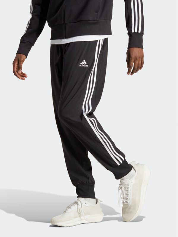 adidas Sportswear adidas Долнище анцуг AEROREADY Essentials Tapered Cuff Woven 3-Stripes Joggers IC0041 Черен Regular Fit