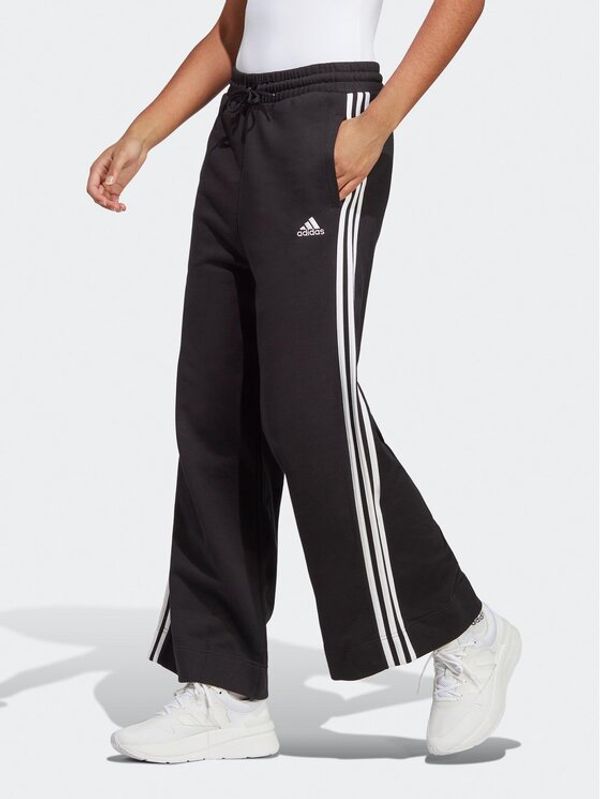 adidas Sportswear adidas Долнище анцуг Essentials 3-Stripes French Terry Wide Joggers IC8775 Черен Regular Fit