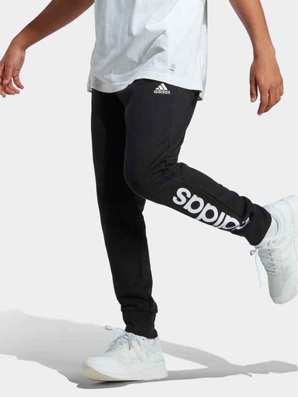 adidas Sportswear adidas Долнище анцуг Essentials French Terry Tapered Cuff Logo Joggers IC0063 Черен Regular Fit