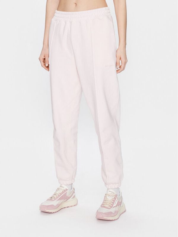 New Balance New Balance Долнище анцуг Athletics Nature WP23553 Розов Relaxed Fit