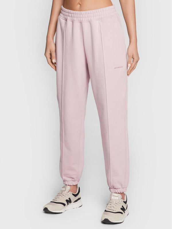 New Balance New Balance Долнище анцуг Athletics Nature WP23553 Розов Relaxed Fit
