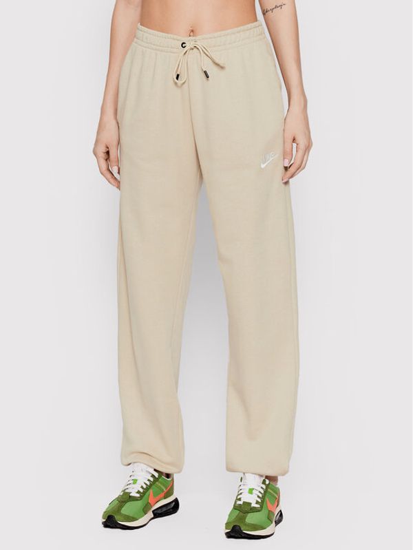 Nike Nike Долнище анцуг Essential BV4091 Бежов Loose Fit