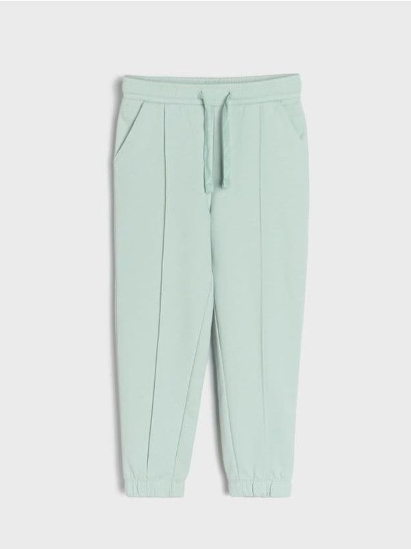 Sinsay Sinsay - Свободни панталони - бледозелено
