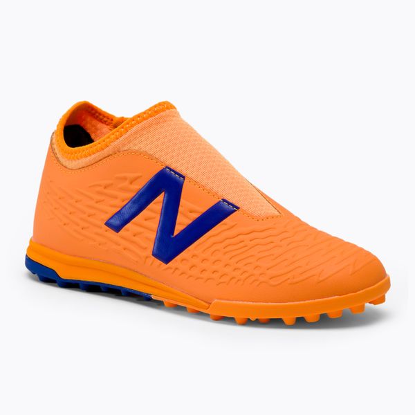 New Balance Детски футболни обувки New Balance Tekela V3+ Magique TF оранжево NBJST3TD35.M.040