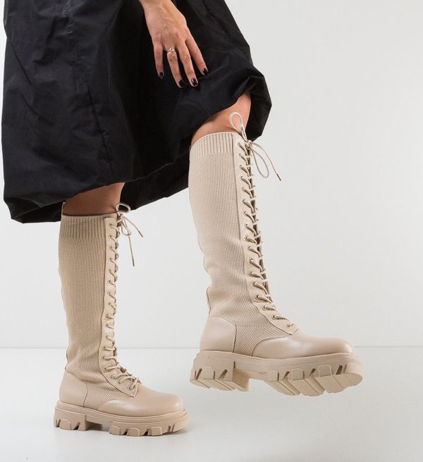 Ali Ботуши Erty Бежов