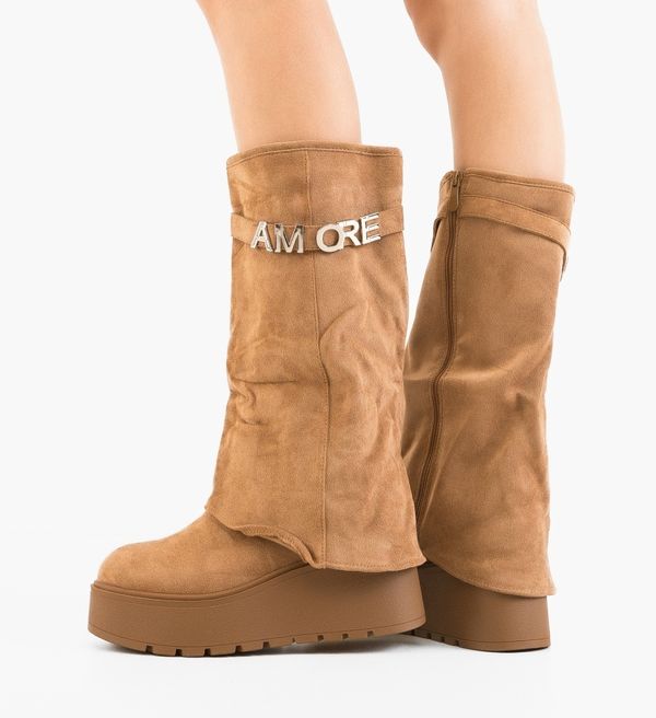 Ali Ботуши Wynne Камел