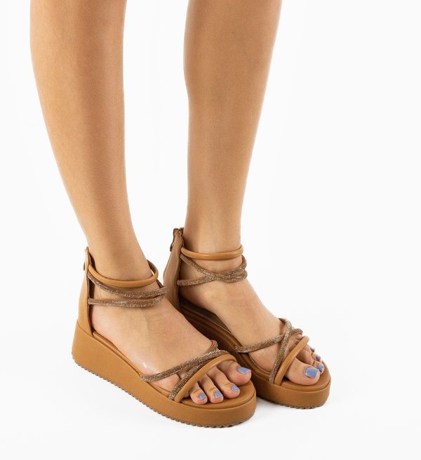 Ali Сандали Brynjar Камел